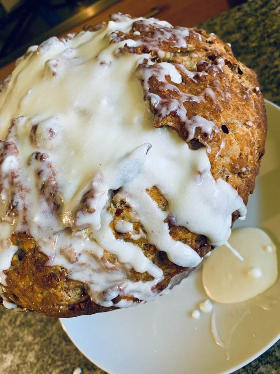 Date cinnamon walnut loaf under white icing, 2025 — photograph by Ray Patrick
